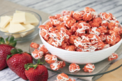 Strawberry Shortcake Poppin Popcorn in bowl on counter with ingredients